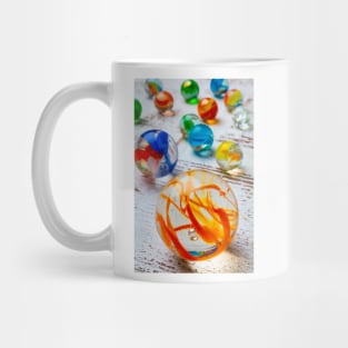 Glass Marbles On White Wooden Board Mug